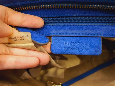 how do you know a michael kors bag is real|michael kors authentication serial number.